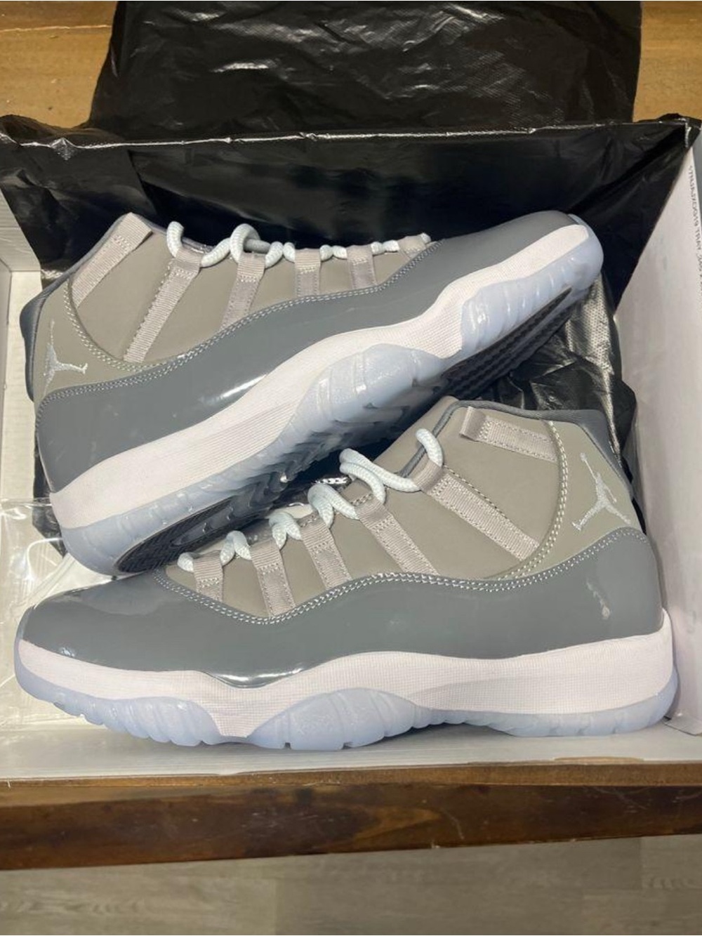 Jordan 11 Retro in Grey and White